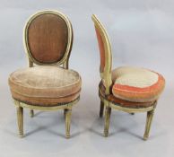 A pair of French cream painted salon chairs with French mobilier stamp to the undersides H.2ft 8in.