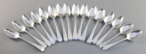 A harlequin set of sixteen George III silver Old English pattern teaspoons, comprising eleven with