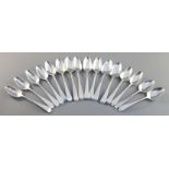 A harlequin set of sixteen George III silver Old English pattern teaspoons, comprising eleven with