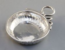 A French silver wine taster, gadrooned and with snake handles, rim inscribed 'Pierre Covrtillov',