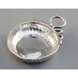 A French silver wine taster, gadrooned and with snake handles, rim inscribed 'Pierre Covrtillov',