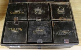 A Victorian tin spice box and contents 9ins