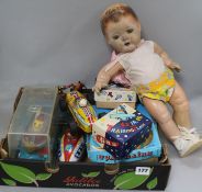 A group of tinplate 1960/1970's, and a doll