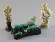 A Chinese soapstone carving of a man holding a jardiniere, 5.25in. and a group of assorted hardstone