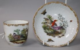 A Berlin cup and saucer, painted with birds and insects