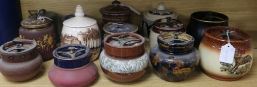 A Doulton tube-lined tobacco jar and fourteen other tobacco jars, various (15)
