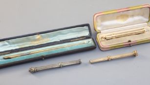 Four gold pencil holders, English and French, late 19th - 20th century, comprising two examples,