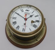 A Smith's brass bulkhead eight day timepiece