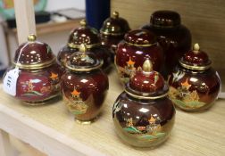 A pair of Carlton Ware Rouge Royale Pagoda ginger jars and covers, five similar small jars and