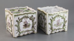 A pair of French faience bough pots and covers, 19th century, of square form, painted in colours