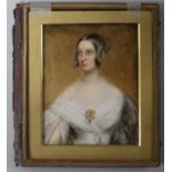 Early 19th century English Schooloil on ivoryPortrait miniature of a lady, half length wearing a