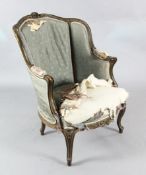 A Louis XV style armchair, late 19th century, covered in striped blue silkhttps://www.gorringes.co.