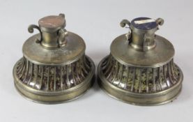 A pair of Art Deco silvered metal and tortoiseshell uplighters, circa 1930, 13in.https://www.