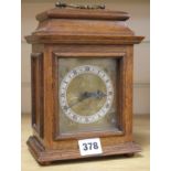 An oak mantel clock 8.5ins