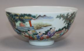 A Chinese porcelain bowl, painted with infants in a landscape, diam. 13.5cm