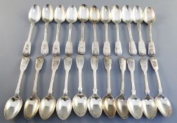 A harlequin set of twenty two William IV silver fiddle and shell pattern teaspoons, engraved with