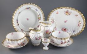 A Copeland Spode 84-piece breakfast service decorated with floral sprigs, retailed by Goode.