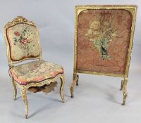 A French giltwood and gesso salon chair, circa 1830 and a giltwood firescreen.https://www.