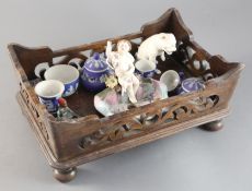 A group of assorted ceramic ornaments and a wooden tray, 12in.https://www.gorringes.co.uk/news/