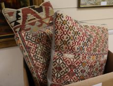 Five various carpet cushions