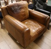 A large brown leather armchair