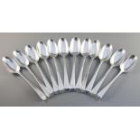 A set of twelve George III silver feather edge pattern tablespoons, engraved with the Houghton