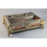 A Victorian gilt brass mounted, red boullework inkstand, decorated with satyr masks and scrolls,
