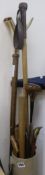 A quantity of walking sticks and two swagger sticks