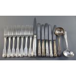 A set of seven George III silver fiddle, thread and shell pattern silver table forks, engraved