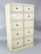 An eau de nil painted chest of 4 short and 3 deep drawers 3ft, H. 5ft. D. 1ft 9in.https://www.