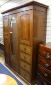 An Edwardian inlaid mahogany wardrobe, W.5ft 1in. H.6ft 8in.