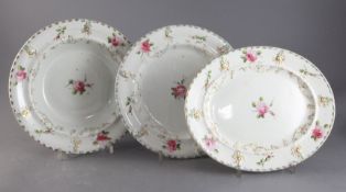 A Mason's Ironstone dinner service, c.1820, painted with pink roses within scroll moulded borders,