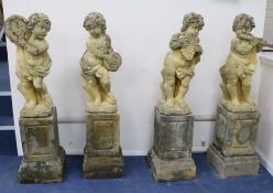 A set of four weathered composition garden statues modelled as putti, on square plinths, H.3ft