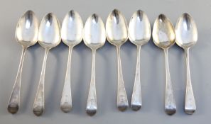 A set of eight George III silver Old English pattern dessert spoons, engraved with the Crewe