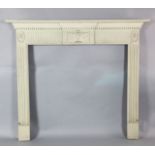 A George III style painted pine chimney piece, circa 1900, 4ft 10in. H. 4ft 3in.https://www.