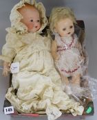 An Armand Marseille Dream Baby doll, No. 341/4K, dressed in Christening gown and bonnet and four