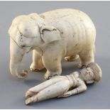 A 19th century Indian carved ivory elephant and an incomplete figure of an attendant 4.5in. & 4in.