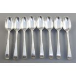 A set of eight George III silver feather edge pattern dessert spoons, monogrammed William and Thomas