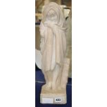 An Italian carved marble figure of a child in winter, signed P. Conti, H.47cm