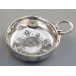 A silver wine taster, in French style, inset with a Louis XVI 1789 One Ecu coin, probably German,