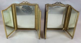 A pair of gold painted triptych dressing table mirrors 2ft 8in. x 4ft 7in.https://www.gorringes.co.