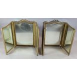 A pair of gold painted triptych dressing table mirrors 2ft 8in. x 4ft 7in.https://www.gorringes.co.