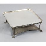 A silver plated and steel warming stand 18.5in.https://www.gorringes.co.uk/news/west-horsley-place-