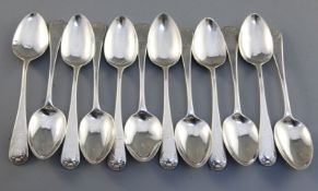 A set of twelve George III silver Old English shell pattern silver teaspoons, maker Thomas Wilkes