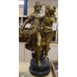 After Auguste Moreau. A gilt and bronze spelter group 'Amatie' H.92cm