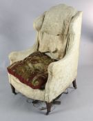 A late 19th century mahogany wing armchair on squared tapered legshttps://www.gorringes.co.uk/news/