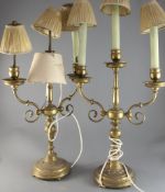 A pair of gilt brass candelabra, circa 1900, the three branches with lobed drip pans, on compound