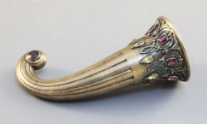 A jewelled silver-gilt posy holder, c.1865, formed as a ribbed horn, with laced and jewelled border,