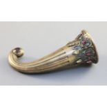 A jewelled silver-gilt posy holder, c.1865, formed as a ribbed horn, with laced and jewelled border,