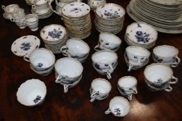 A Meissen 71-piece part breakfast service, circa 1910, printed and painted with floral sprays,